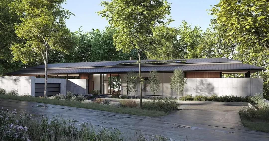Contemporary eco-friendly home surrounded by trees, featuring clean architectural lines and large windows.
